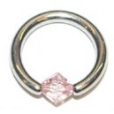 Titanium ringetje met roze steentje